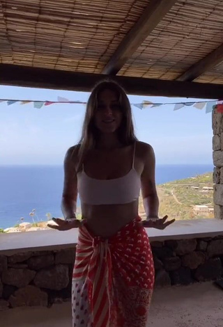 1. Erotic Gaia in White Crop Top on the Balcony