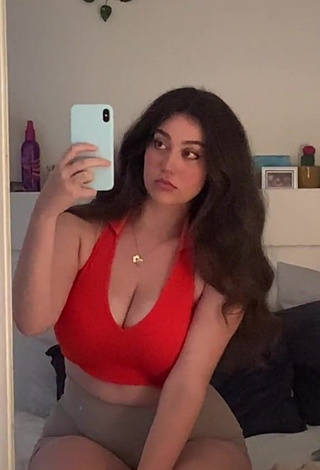 1. Really Cute Simone Shows Cleavage in Red Crop Top