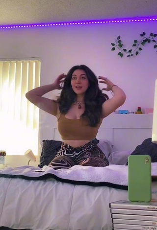 Adorable Simone Shows Cleavage in Seductive Olive Crop Top