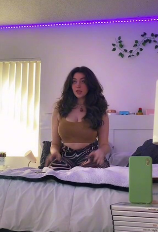 3. Adorable Simone Shows Cleavage in Seductive Olive Crop Top