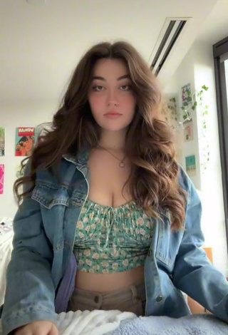 1. Sensual Simone Shows Cleavage in Floral Crop Top