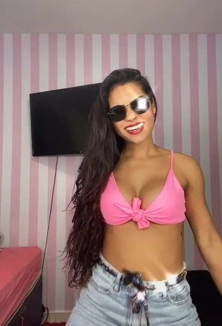 Sweet Ingrid Muniz Shows Cleavage in Cute Pink Bikini Top