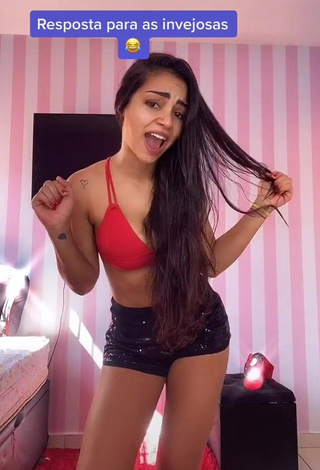 Irresistible Ingrid Muniz Shows Cleavage in Red Bikini Top