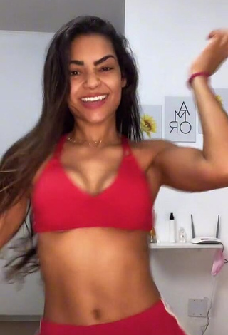 1. Cute Ingrid Muniz Shows Cleavage in Red Sport Bra