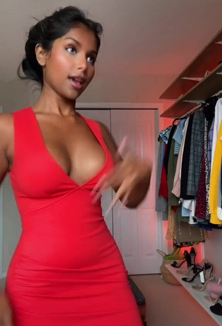 Irresistible Ishini W Shows Cleavage in Red Dress