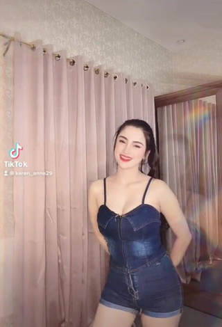 Erotic Karen Anne Tuazon Shows Cleavage in Overall