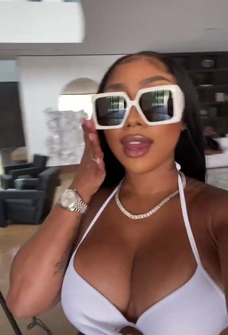 1. Erotic Ariana Fletcher Shows Cleavage in White Bikini Top