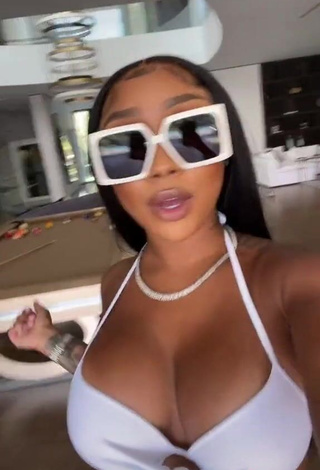 3. Erotic Ariana Fletcher Shows Cleavage in White Bikini Top
