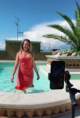 Erotic lalequita in Red Dress at the Pool