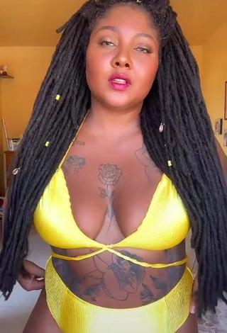 Irresistible Manu Mendes Shows Cleavage in Yellow Bikini