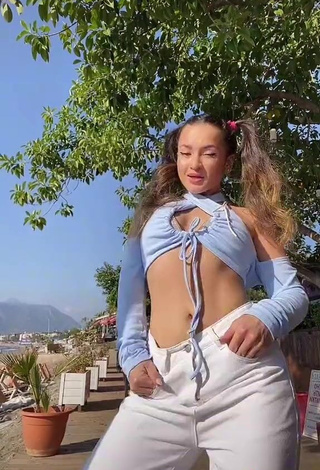 3. Hot Mari M in Blue Crop Top in a Street