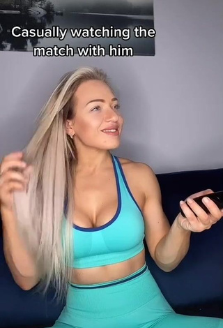 1. Beautiful Maria Shows Cleavage in Sexy Blue Sport Bra