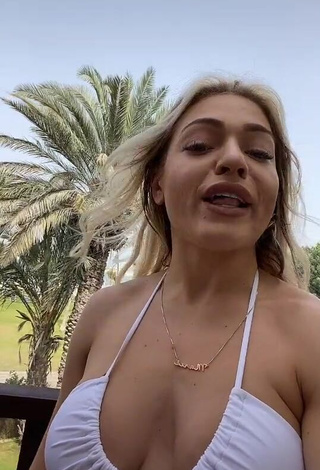 1. Hot Maria Shows Cleavage in White Bikini Top