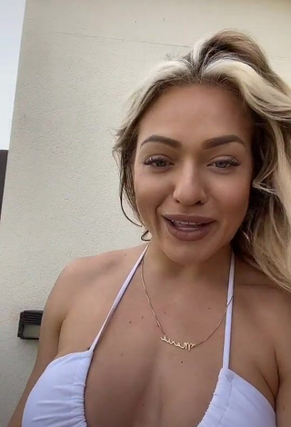 Hot Maria Shows Cleavage in White Bikini Top