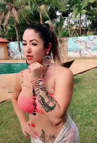 3. Captivating Naiara Coelho in Pink Bikini at the Pool