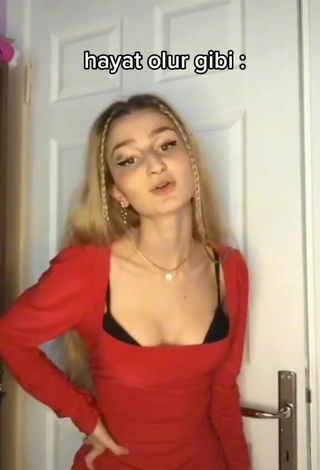 3. Erotic Övgü Aykan Shows Cleavage in Red Dress