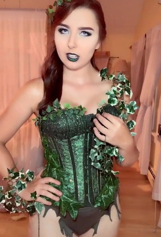 Erotic Ari in Green Corset