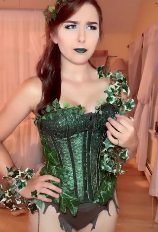 3. Erotic Ari in Green Corset