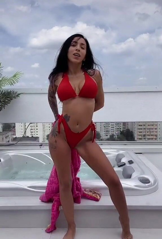 3. Cute Ruby Shows Cleavage in Red Bikini