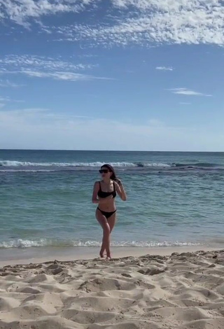 Erotic Şeyda Erdoğan Shows Cleavage in Black Bikini at the Beach