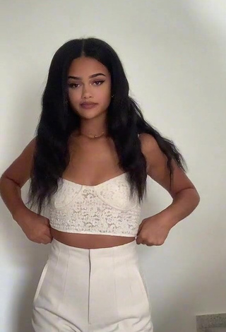 3. Captivating Sidney in White Crop Top