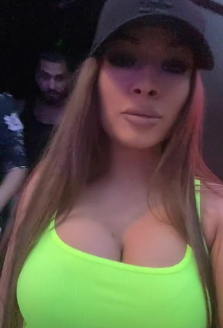 Sweetie Simonna Braboveanu Shows Cleavage in Lime Green Crop Top