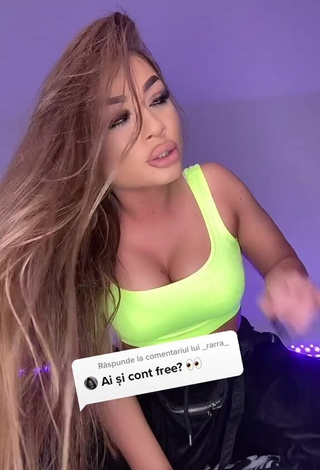 Beautiful Simonna Braboveanu Shows Cleavage in Sexy Lime Green Crop Top