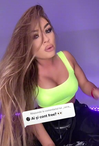 3. Beautiful Simonna Braboveanu Shows Cleavage in Sexy Lime Green Crop Top