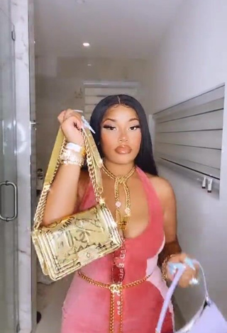 Irresistible Stefflon Don Shows Cleavage in Peach Dress