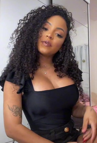 2. Captivating Ziane Martins Shows Cleavage in Black Top