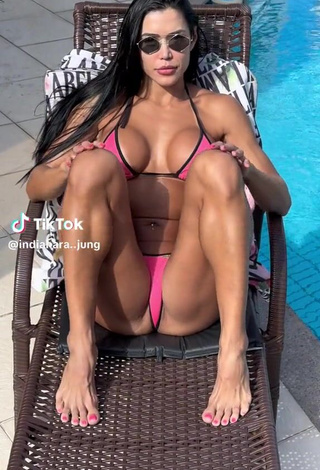 Erotic Indianara Jung Shows Cleavage in Bikini while Leg Spread (Side Boob)