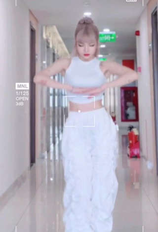 1. Wonderful Bùi Thảo Ly in White Crop Top