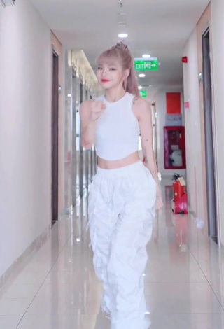 3. Wonderful Bùi Thảo Ly in White Crop Top