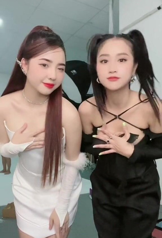 1. Erotic Cindy Diễm Mii Shows Cleavage in White Dress