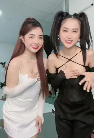 Erotic Cindy Diễm Mii Shows Cleavage in White Dress