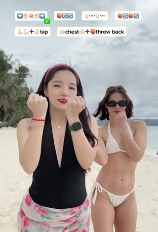 1. Erotic Dasuri Choi Shows Cleavage in Black Swimsuit at the Beach (Side Boob)