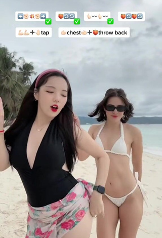 Erotic Dasuri Choi Shows Cleavage in Black Swimsuit at the Beach (Side Boob)