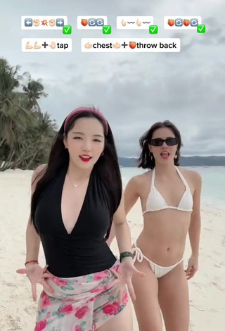 3. Erotic Dasuri Choi Shows Cleavage in Black Swimsuit at the Beach (Side Boob)