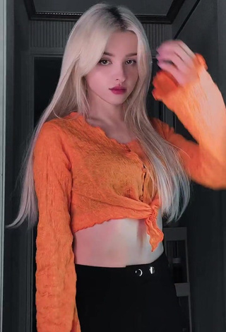 1. Captivating Elina Karimova in Orange Crop Top