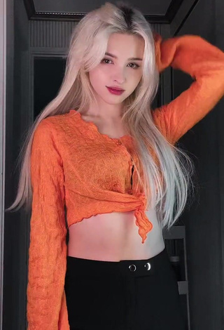 Captivating Elina Karimova in Orange Crop Top