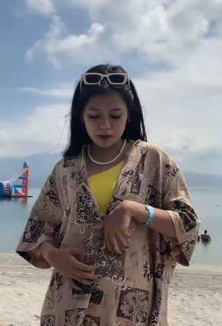 Cute Eya Borja Shows Cleavage in Yellow Bikini