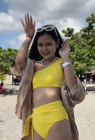 Hot Eya Borja Shows Cleavage in Yellow Bikini