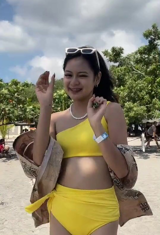 3. Hot Eya Borja Shows Cleavage in Yellow Bikini