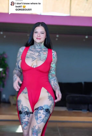 2. Alluring Heidi Lavon Shows Cleavage in Erotic Red Dress