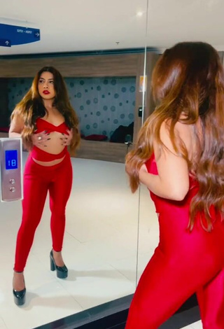 Irresistible Ingrid Ohara Shows Cleavage in Red Overall (Underboob)