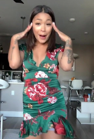 3. Erotic Leilani Green in Floral Dress