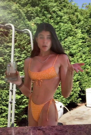 1. Sweetie Nicole Johnson in Orange Bikini