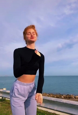 Cute Alyssa Holum in Black Crop Top in the Sea