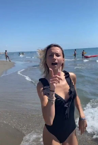 2. Irresistible Martina Picardi in Black Swimsuit at the Beach