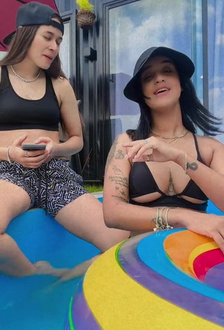 Lovely Jenny Camacho Shows Cleavage in Black Bikini Top (Underboob)